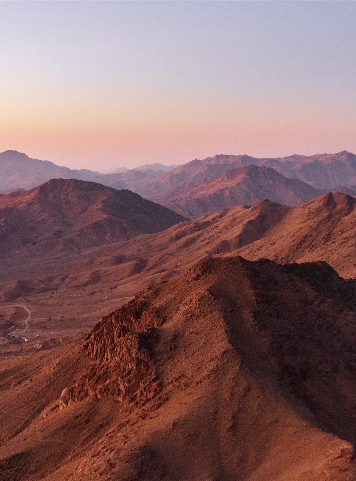 The Sinai mountain ranges turning red at dusk