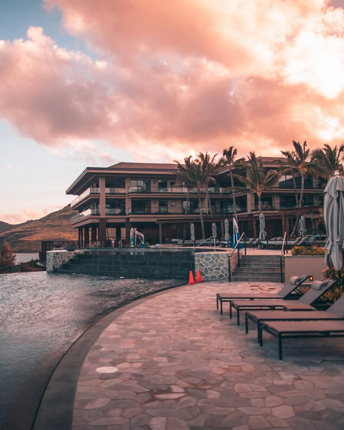 A five-star resort above the sea at sunset